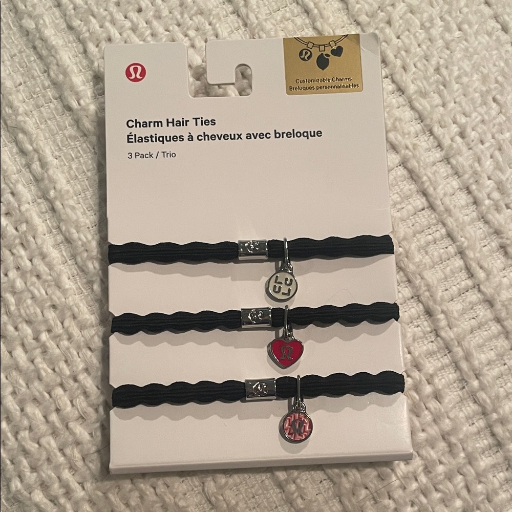 Lululemon Black Hair Tie Set with Silver and Red Charms - 3 Pack